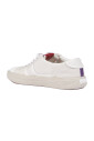 white-leather-sneakers-with-pink-fabric-tongue