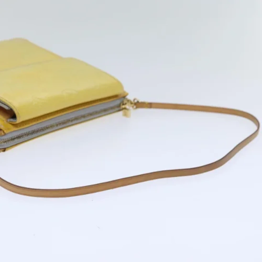 Louis Vuitton Vintage Pre-owned Fabric clutches Yellow Dames