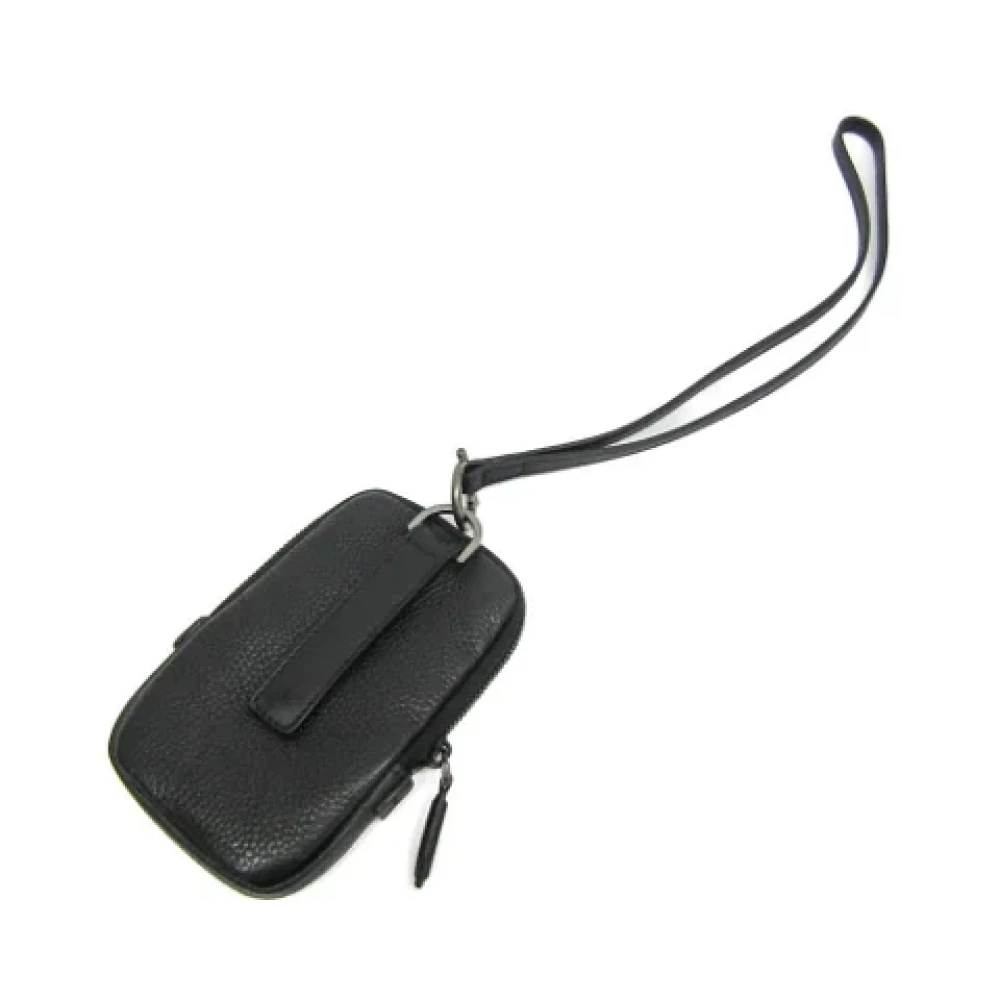 Salvatore Ferragamo Pre-owned Leather pouches Black Dames