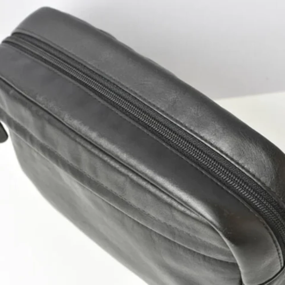 Coach Pre-owned Leather clutches Black Dames