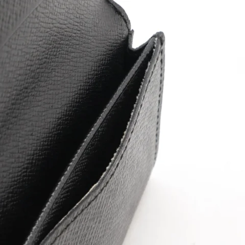 Louis Vuitton Vintage Pre-owned Leather wallets Black Heren