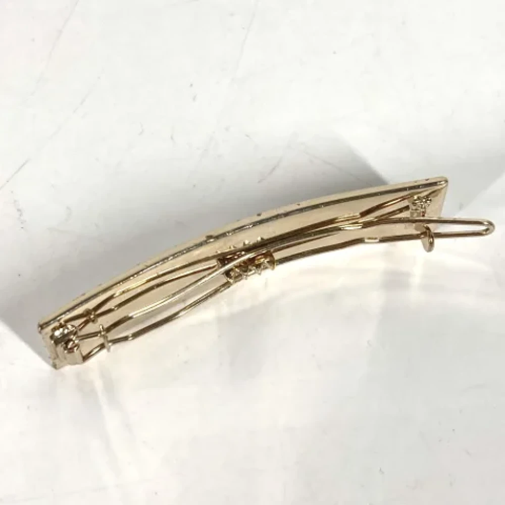 Chanel Vintage Pre-owned Metal hair-accessories Yellow Dames