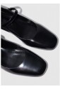 black-leather-flat-sandals