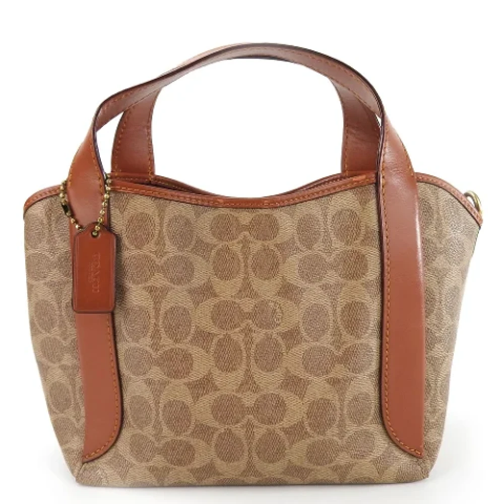 Coach Pre-owned Plastic handbags Brown Dames