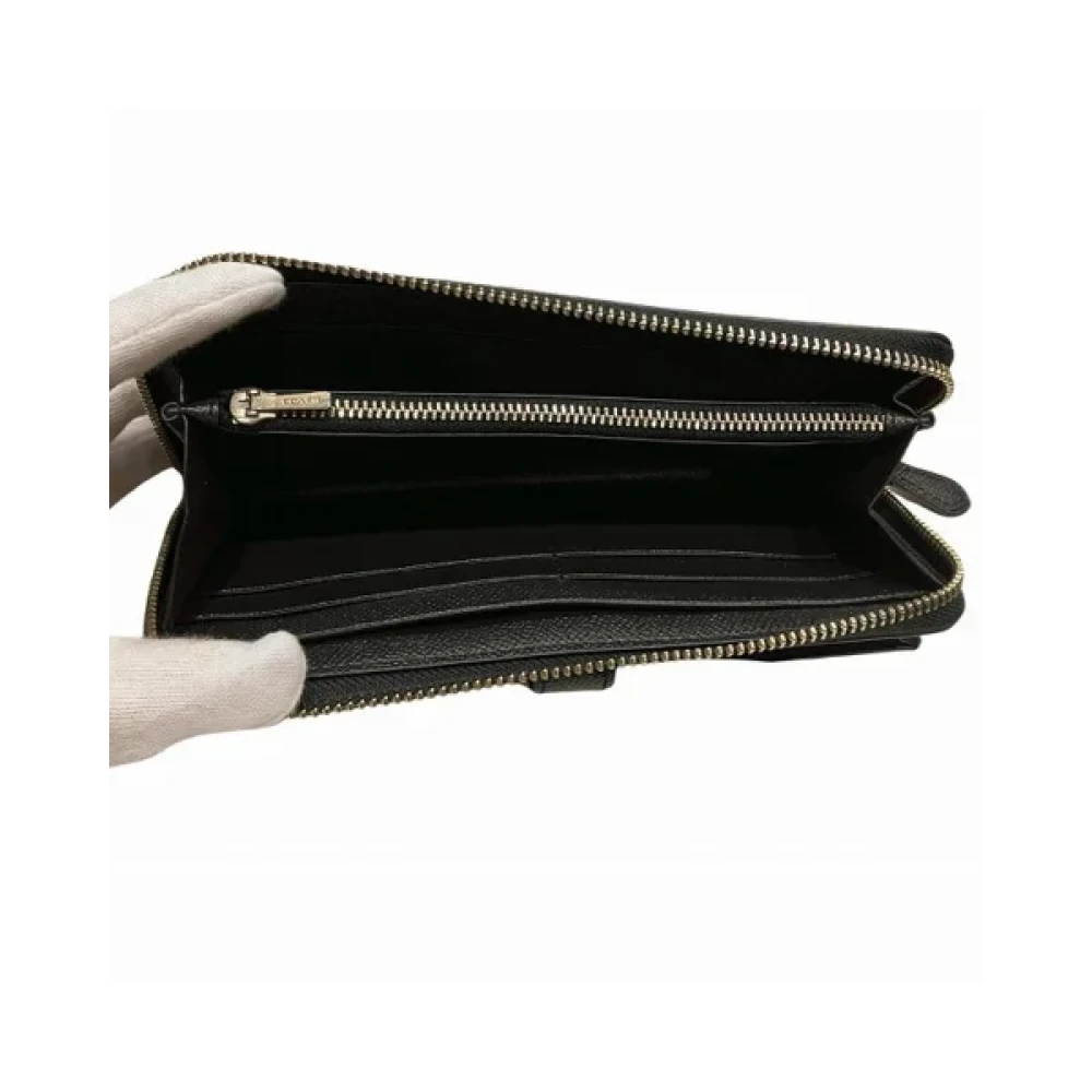 Coach Pre-owned Leather wallets Black Dames