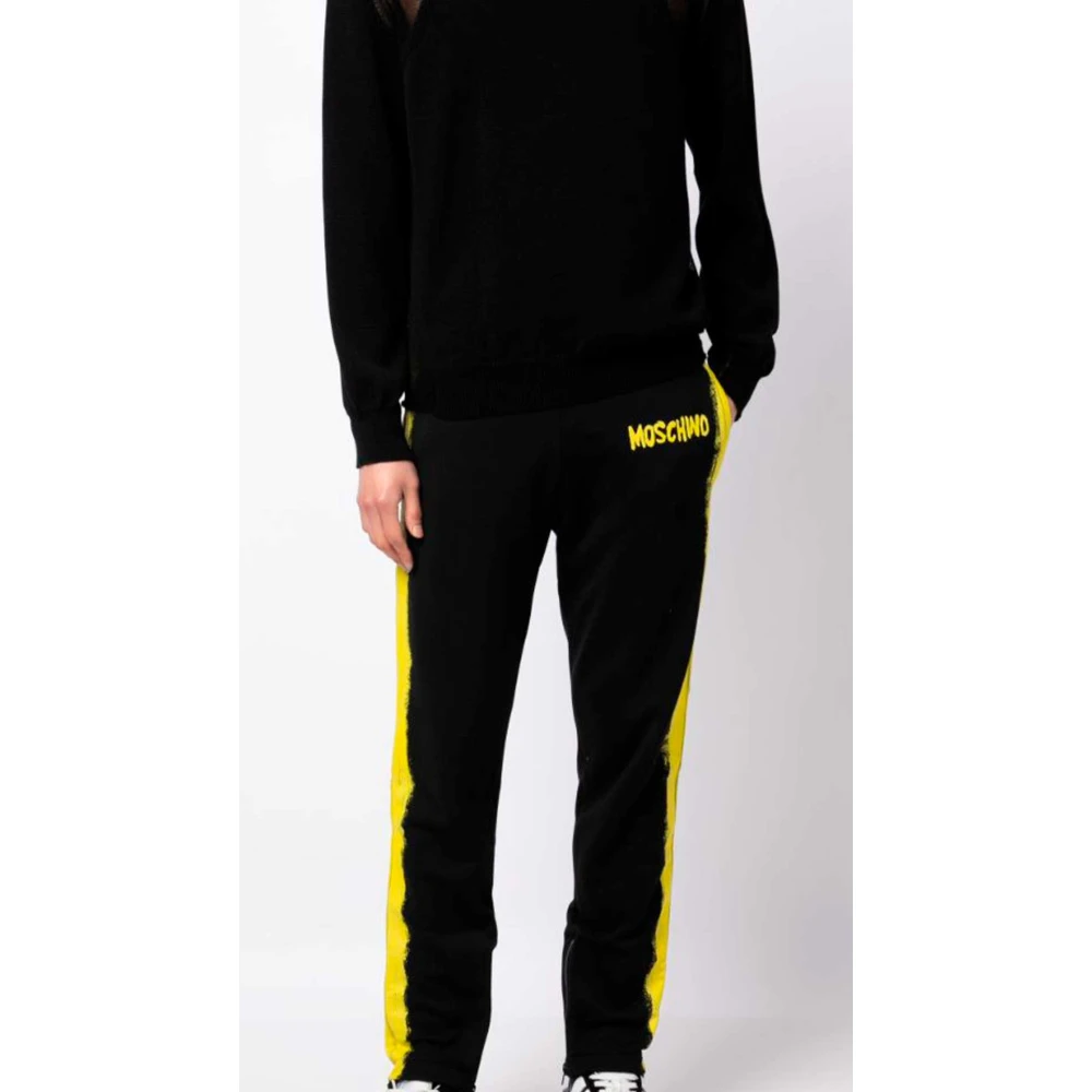 Moschino Zwarte sweatpants met gele verfeffect Black Heren