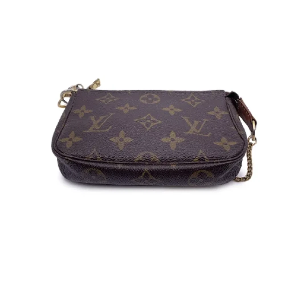 Louis Vuitton Vintage Pre-owned Fabric clutches Brown Dames