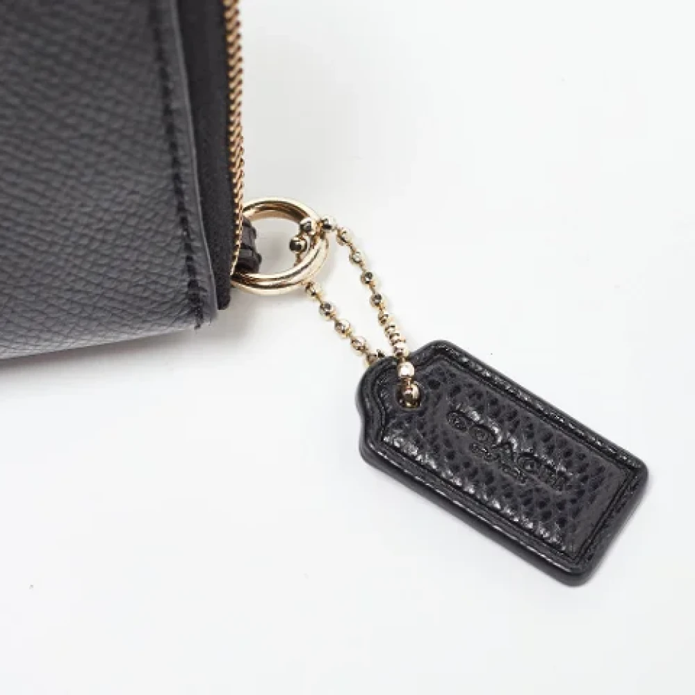 Coach Pre-owned Leather wallets Black Dames