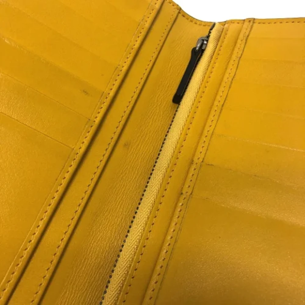 Jimmy Choo Pre-owned Leather wallets Yellow Dames