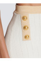 jupe-courte-en-maille-a-bordures-dorees