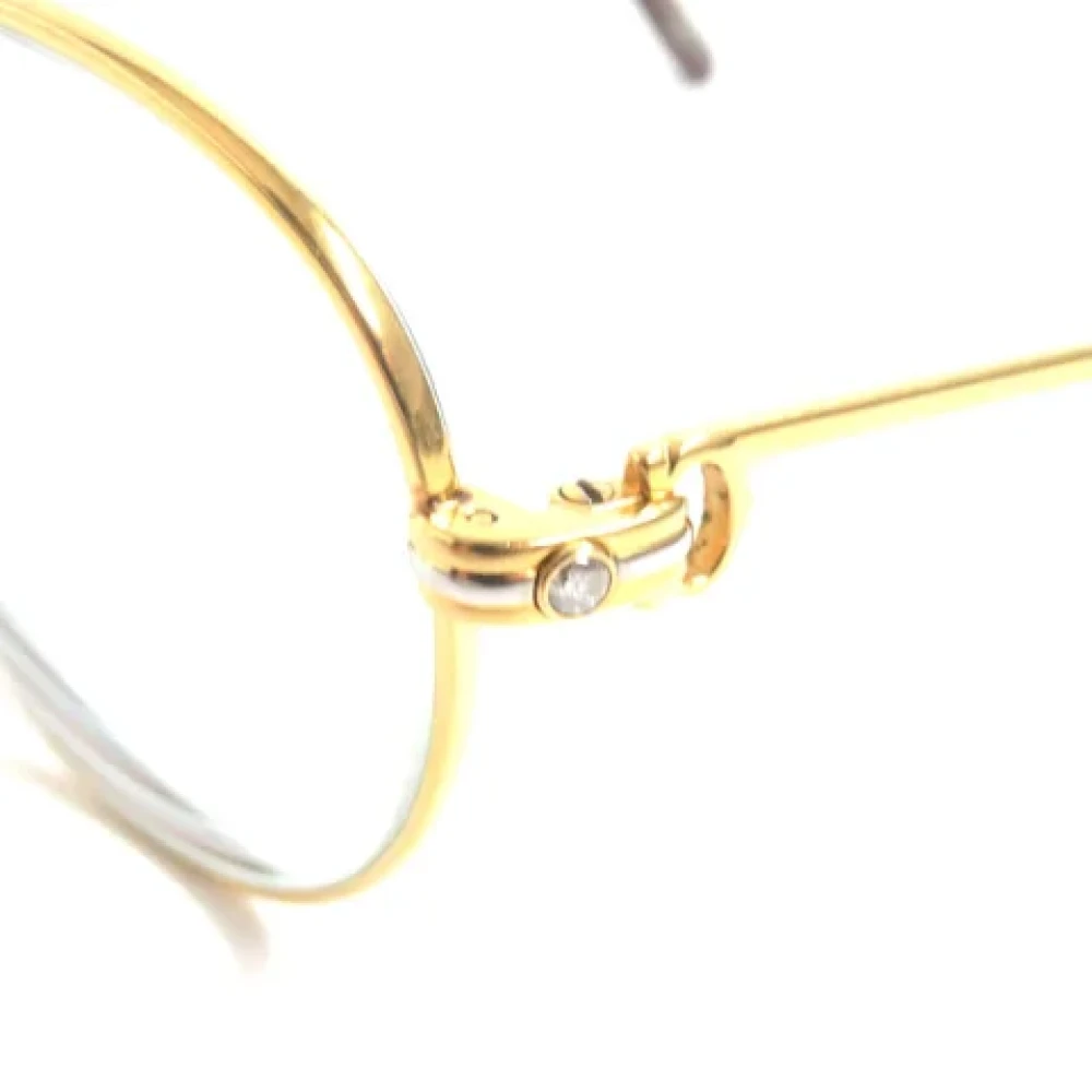 Cartier Vintage Pre-owned Metal sunglasses Yellow Dames