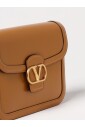 sac-a-bandouliere-dore-a-clous
