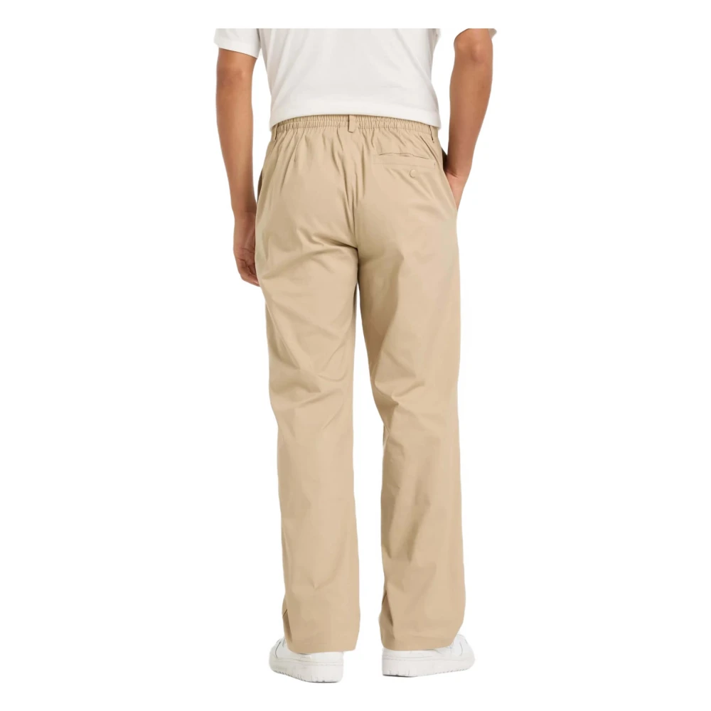 New Balance Atletiek Standaard Lange broek Beige Heren