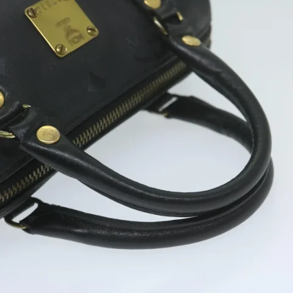 MCM Pre-owned Canvas handbags Black Dames