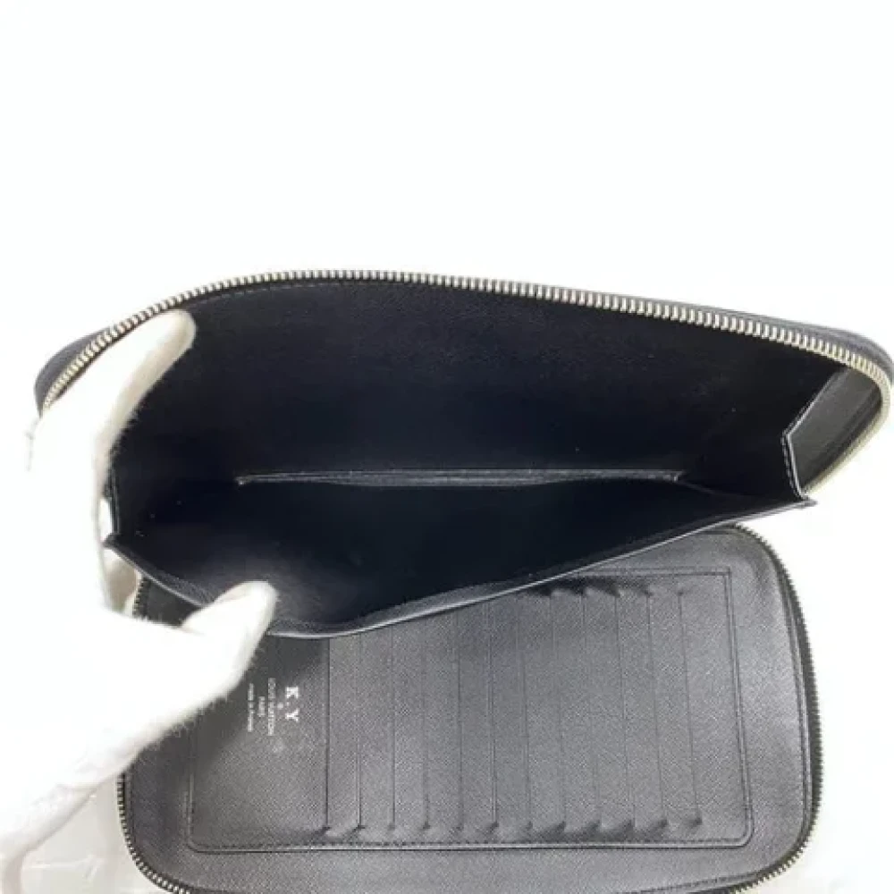 Louis Vuitton Vintage Pre-owned Leather wallets Black Heren