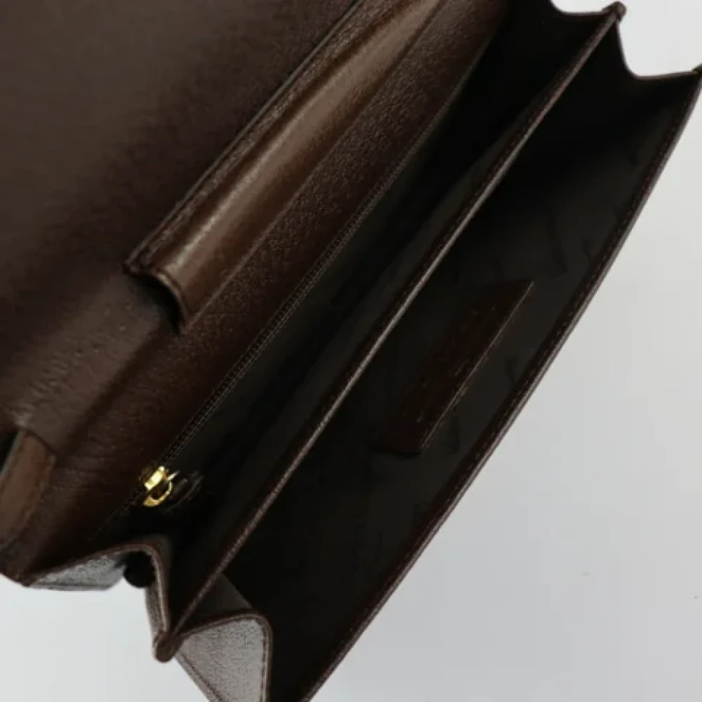 Salvatore Ferragamo Pre-owned Leather clutches Brown Unisex