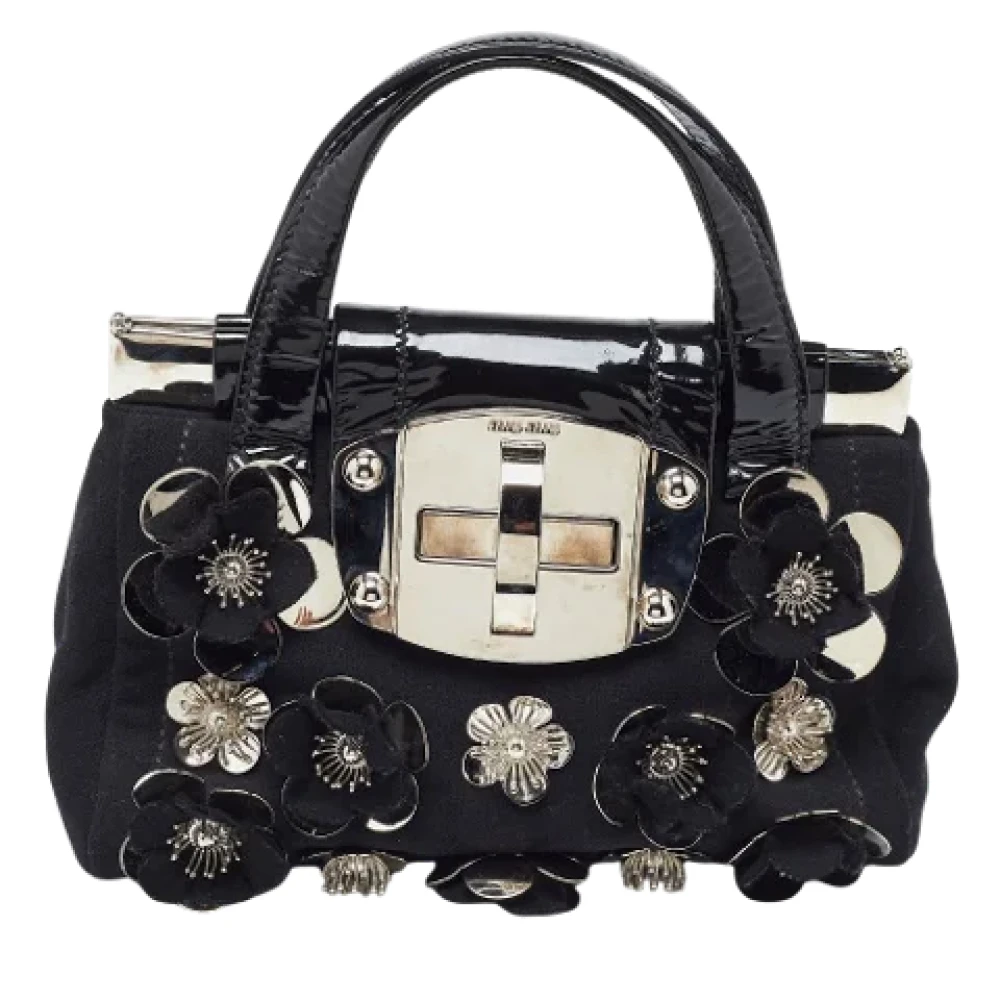 Miu Pre-owned Canvas handbags Black Dames