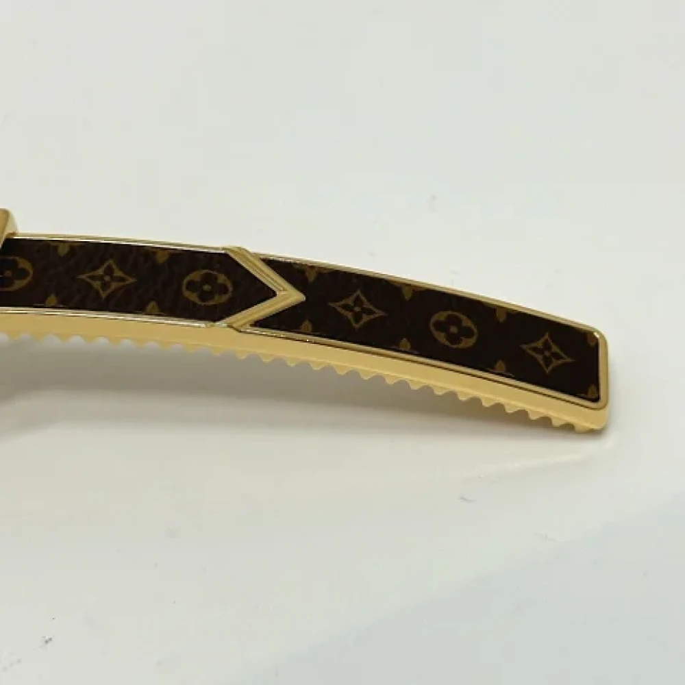 Louis Vuitton Vintage Pre-owned Metal hair-accessories Brown Dames
