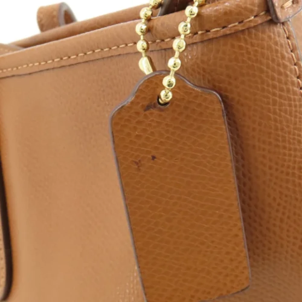 Coach Pre-owned Plastic shoulder-bags Brown Dames