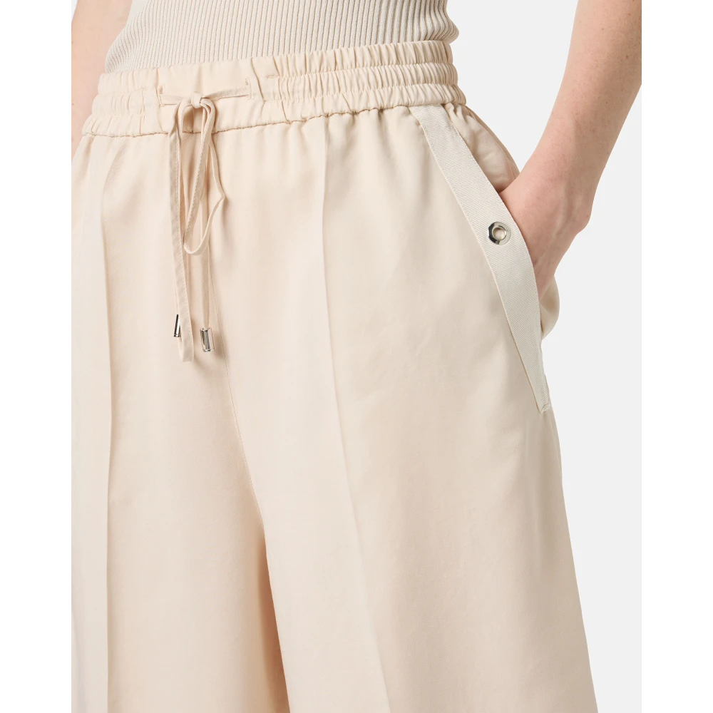 Iceberg Poederkleurige comfort fit Bermuda shorts van vloeiende Tencel-stof Beige Dames