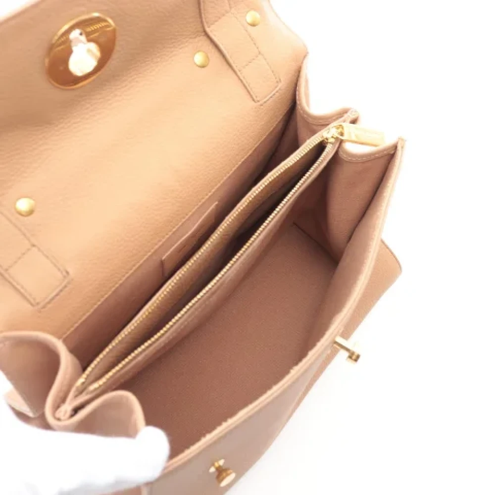 Yves Saint Laurent Vintage Pre-owned Leather handbags Beige Dames