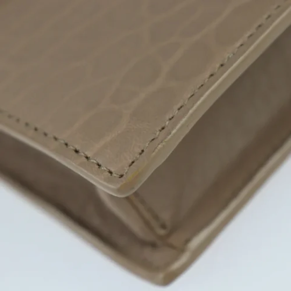 Jimmy Choo Pre-owned Leather clutches Beige Dames