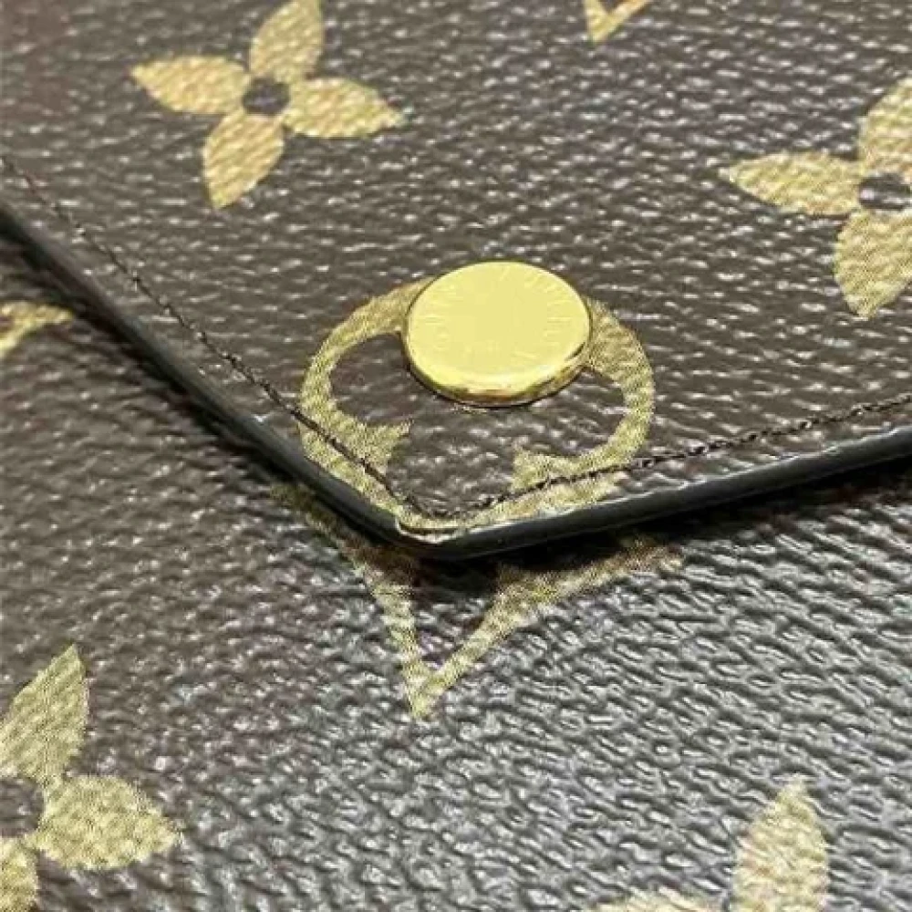 Louis Vuitton Vintage Pre-owned Fabric wallets Brown Dames