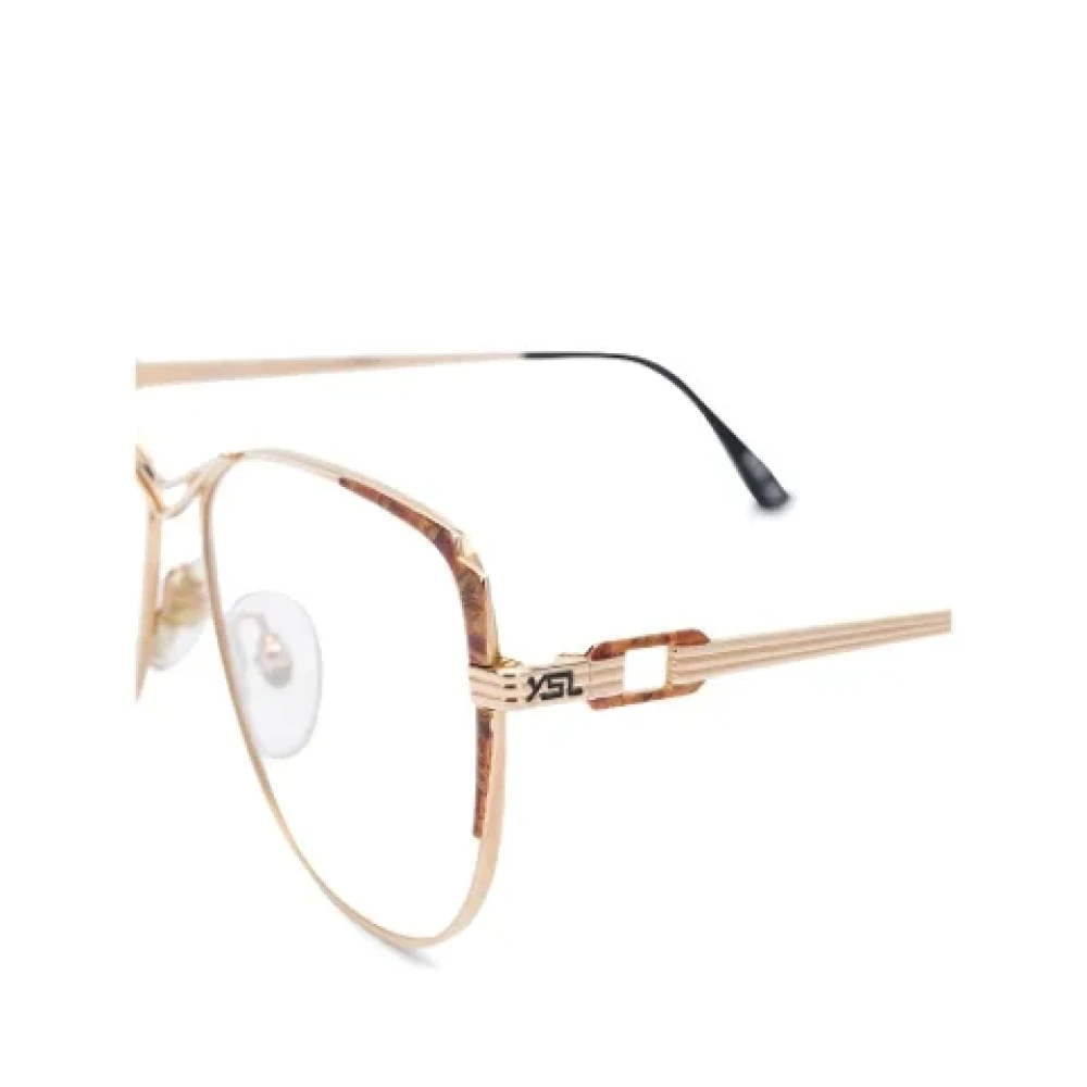 Yves Saint Laurent Vintage Pre-owned Metal sunglasses Yellow Dames
