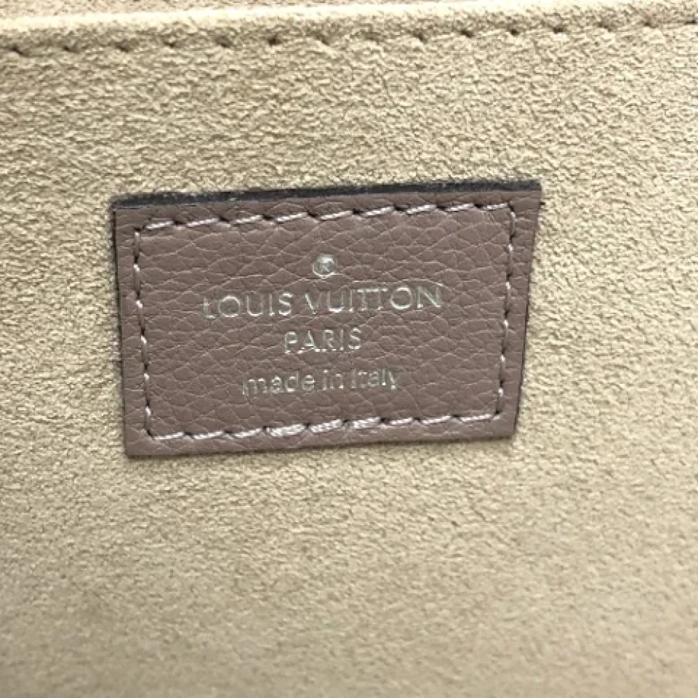 Louis Vuitton Vintage Pre-owned Leather clutches Beige Dames