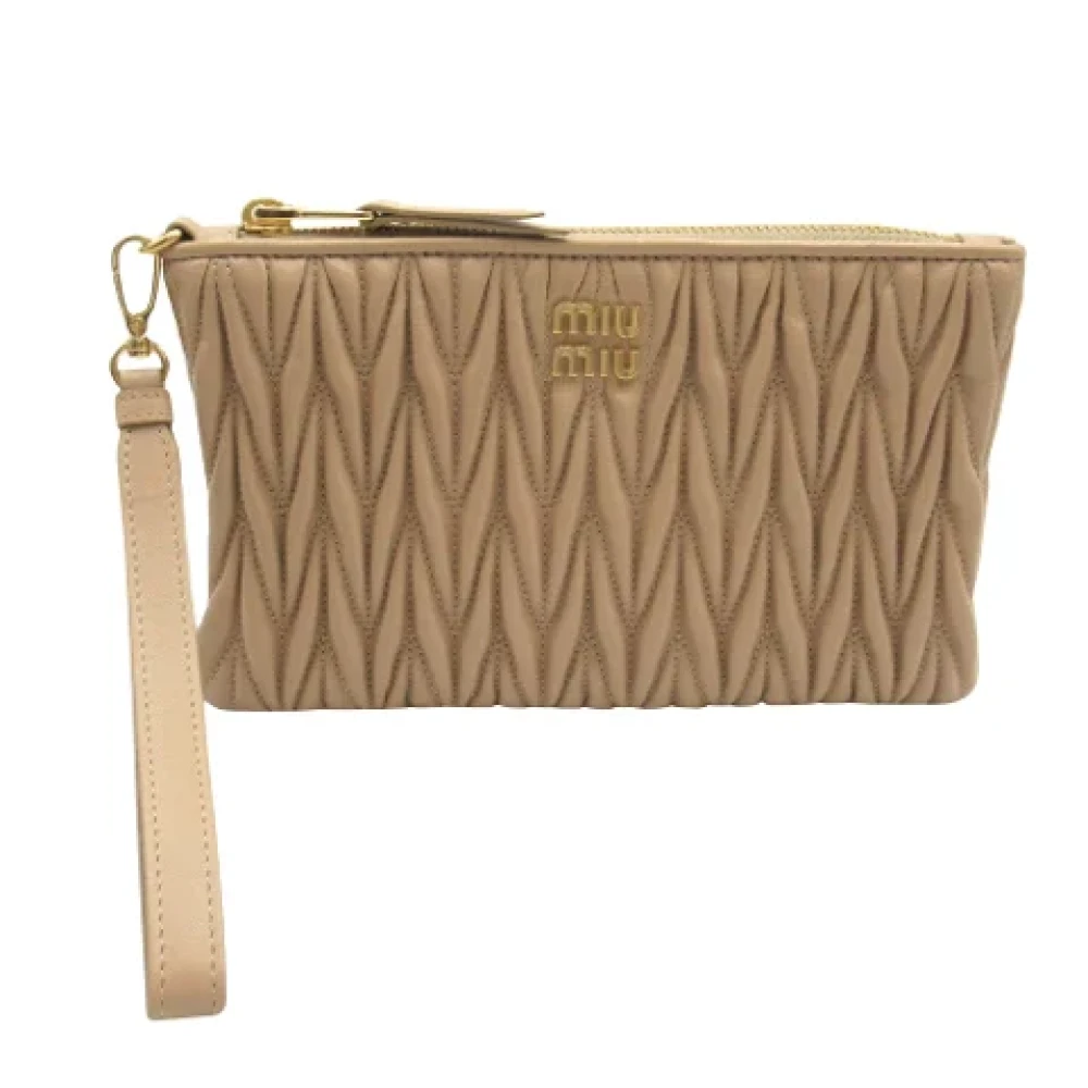 Miu Pre-owned Leather clutches Beige Dames