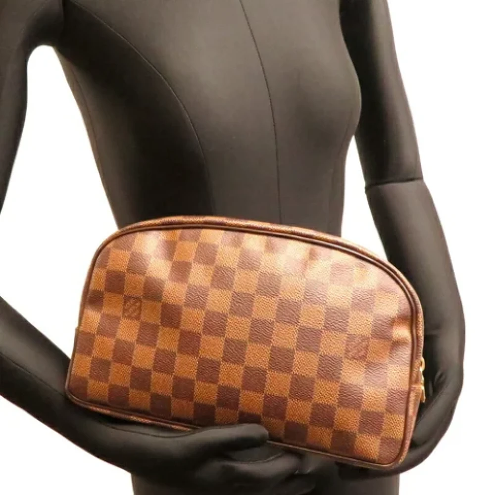 Louis Vuitton Vintage Pre-owned Canvas clutches Brown Unisex