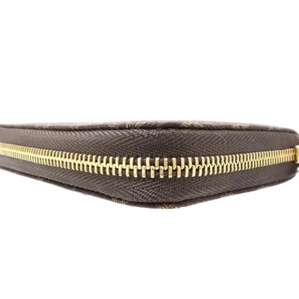 Louis Vuitton Vintage Pre-owned Denim wallets Brown Dames