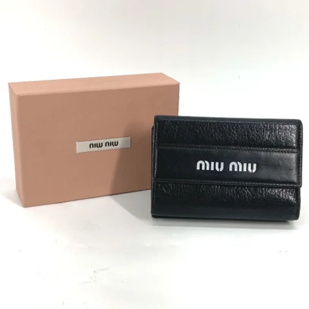 Miu Pre-owned Leather wallets Black Dames