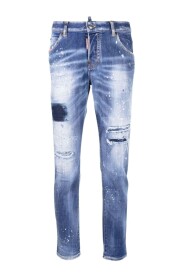 Granatowe obcisłe jeansy z plamami farby