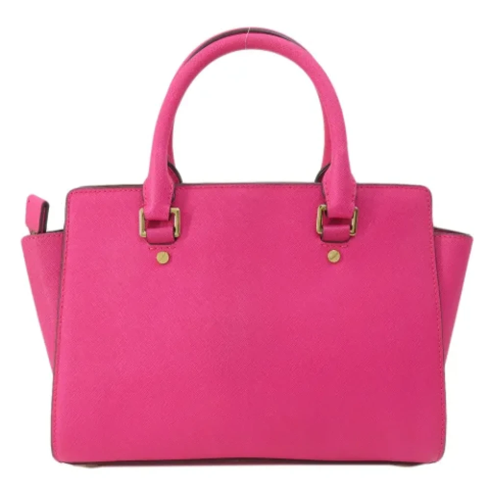 Michael Kors Pre-owned Fabric handbags Pink Dames