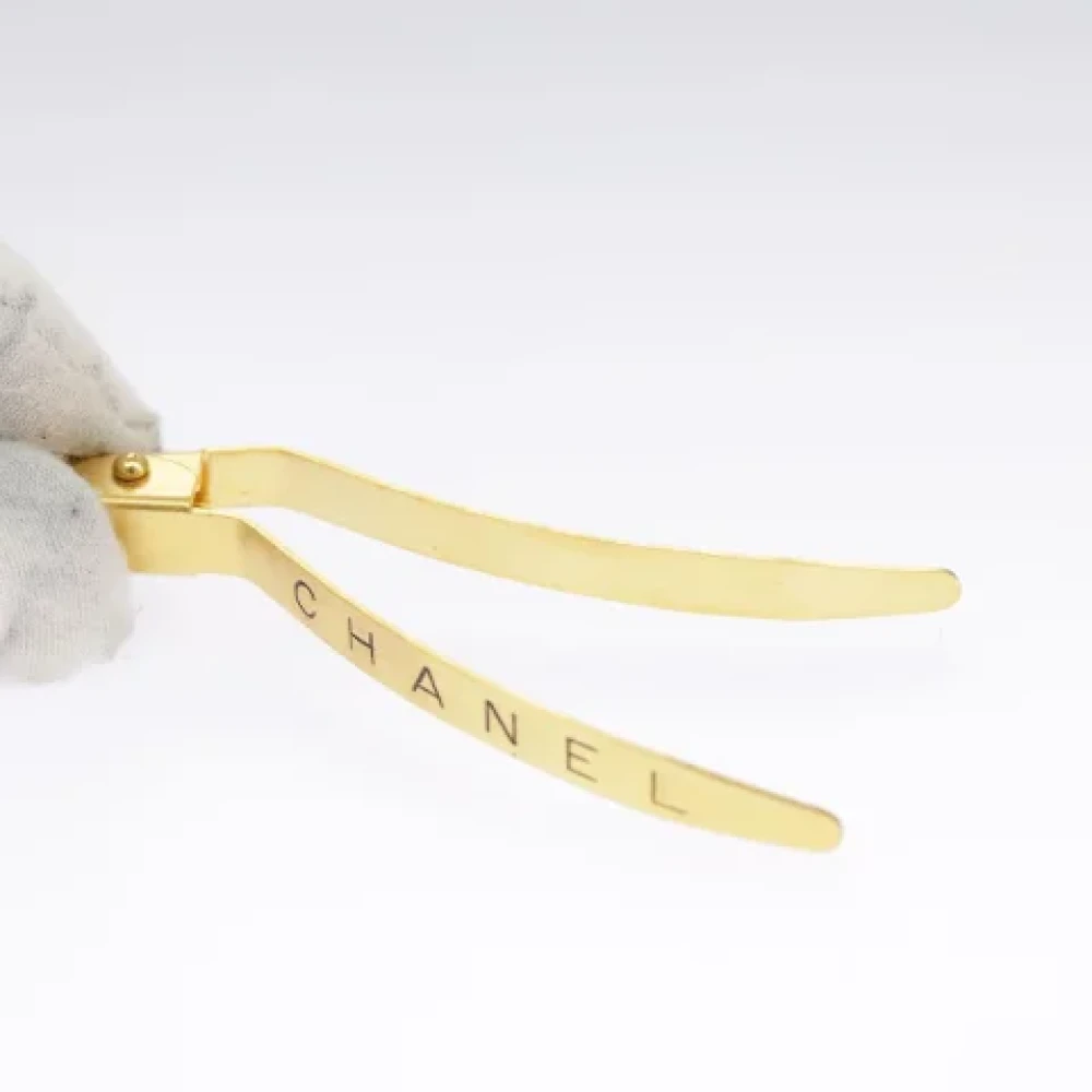 Chanel Vintage Pre-owned Metal hair-accessories Yellow Dames