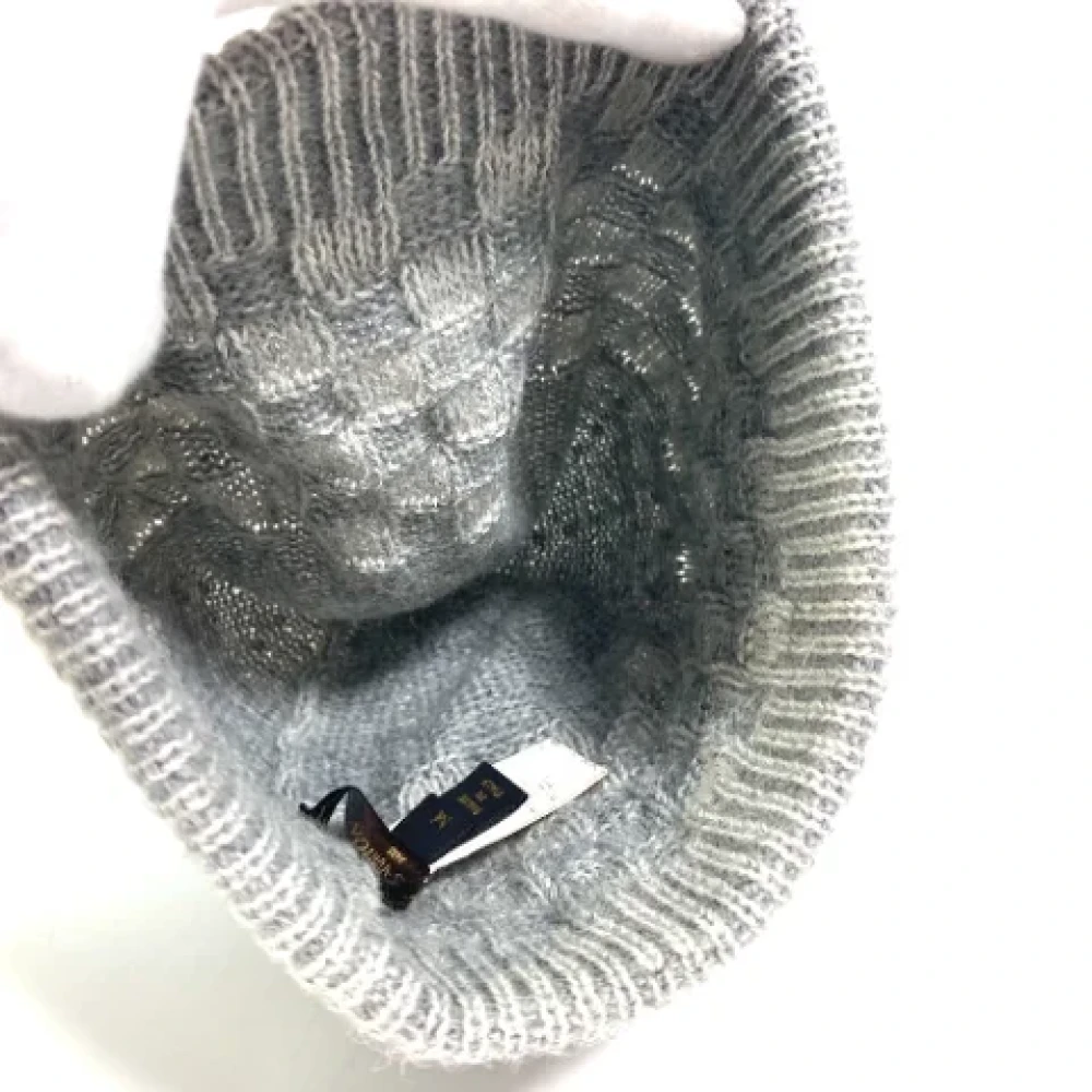 Louis Vuitton Vintage Pre-owned Wool hats Gray Dames