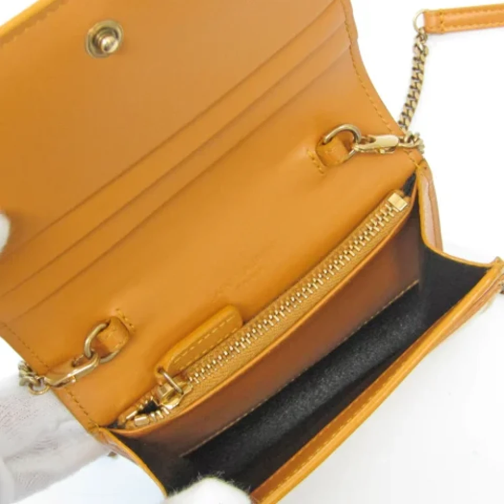 Yves Saint Laurent Vintage Pre-owned Leather wallets Orange Dames