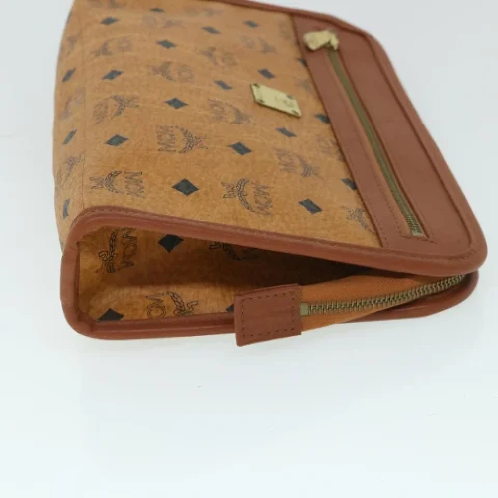 MCM Pre-owned Leather clutches Brown Dames