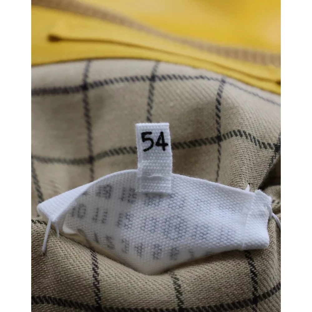 Maison Margiela Pre-owned Plastic outerwear Yellow Dames