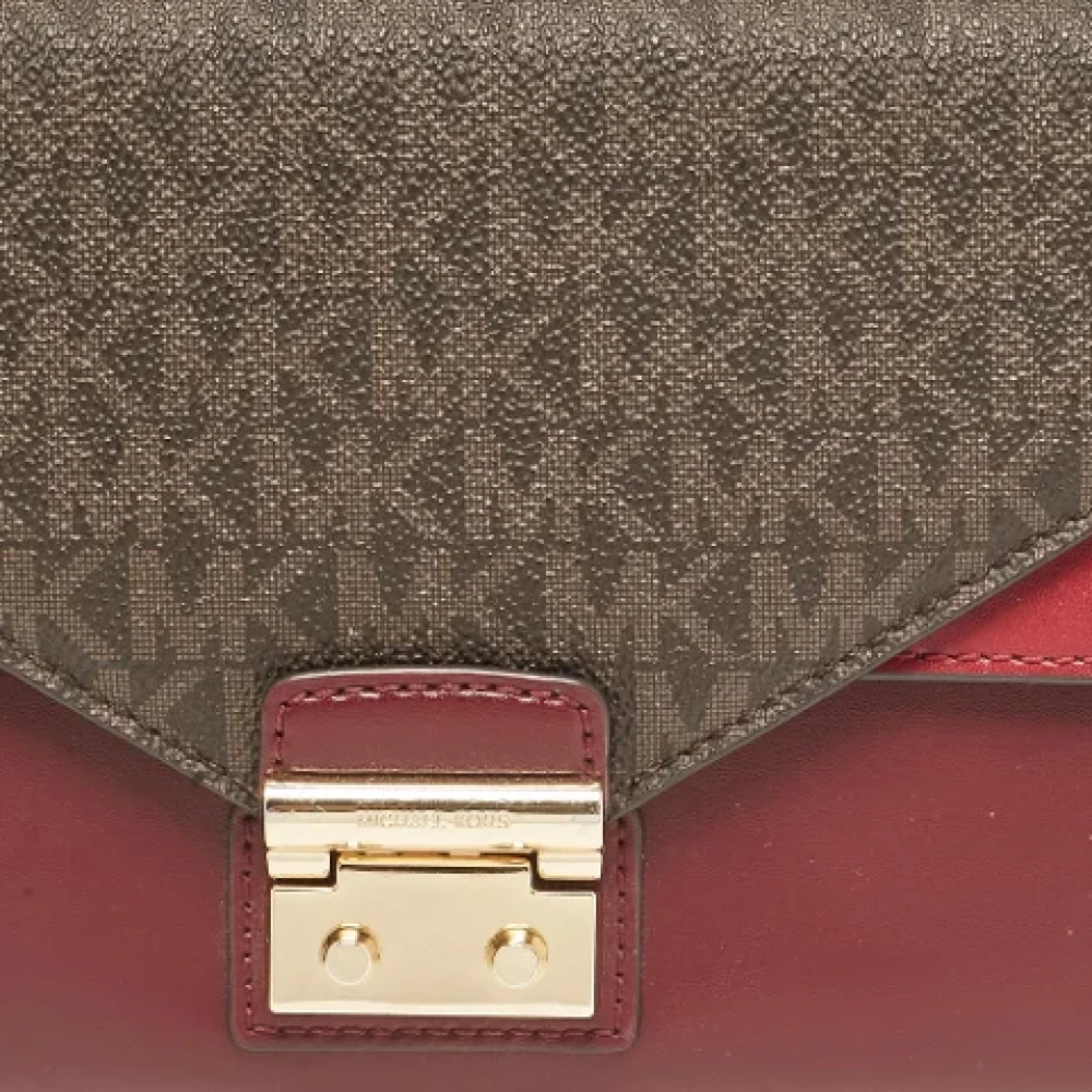 Michael Kors Pre-owned Canvas clutches Red Dames