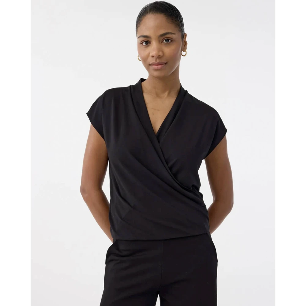 Knit-ted Mouwloze Jet Top Black Dames