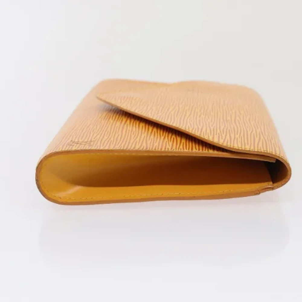 Louis Vuitton Vintage Pre-owned Leather clutches Yellow Dames