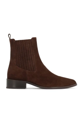 Bruna mockaläderslippers.Denna produkt är liten i storleken.