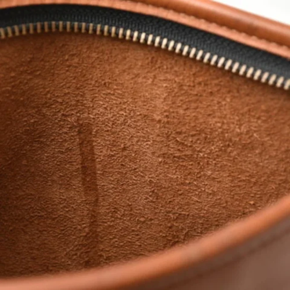 Coach Pre-owned Leather clutches Brown Dames