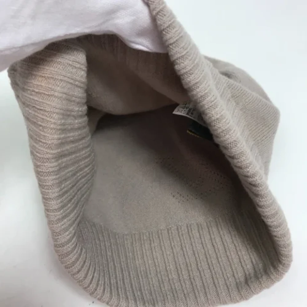 Louis Vuitton Vintage Pre-owned Wool hats Beige Dames