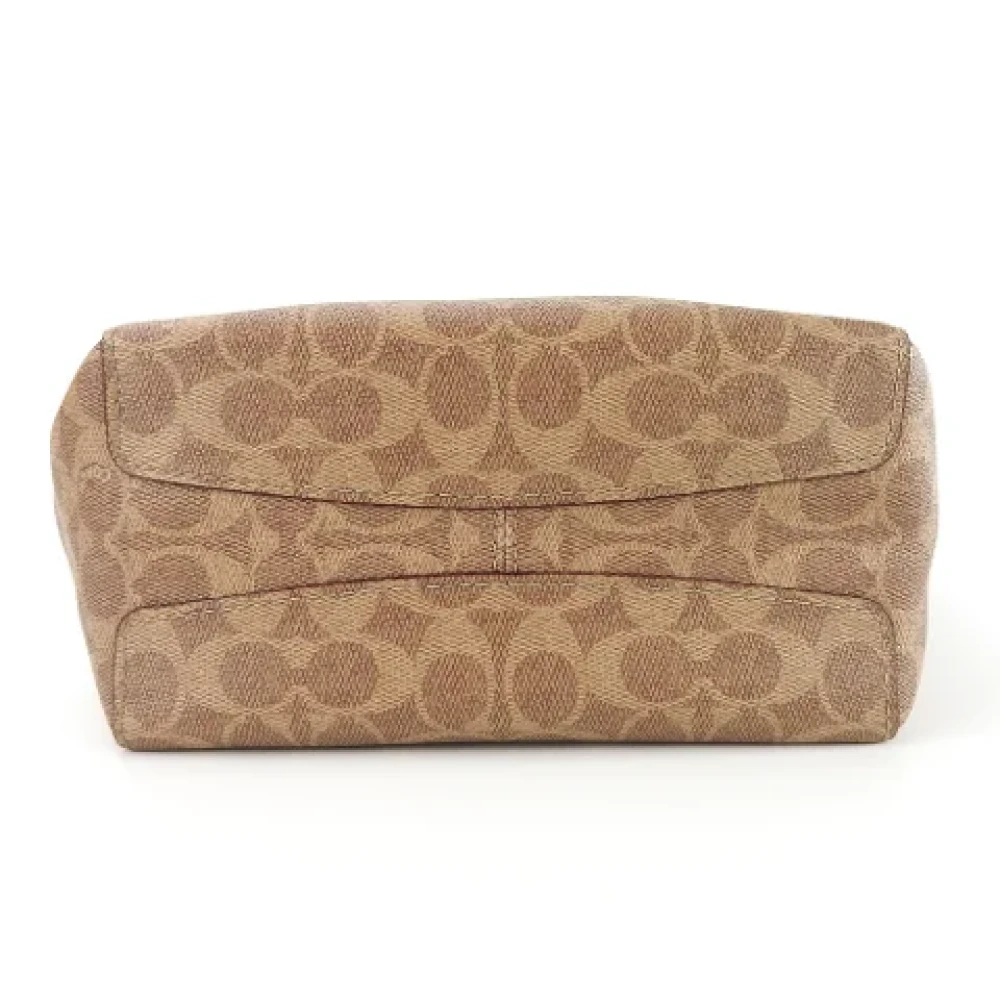 Coach Pre-owned Plastic handbags Brown Dames