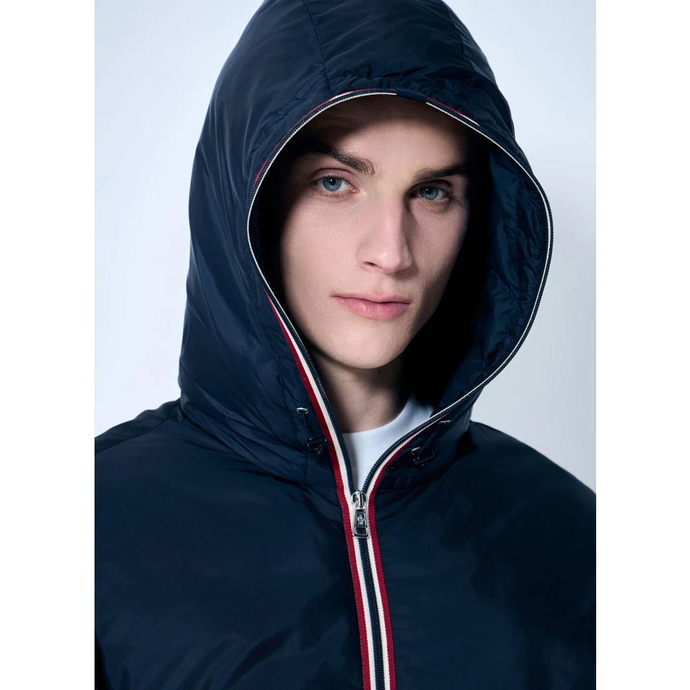 Moncler Waterafstotende gewatteerde jas met capuchon en afwerking Blue Heren
