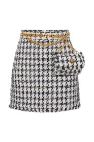 Krótka spódnica z elegancką torbą