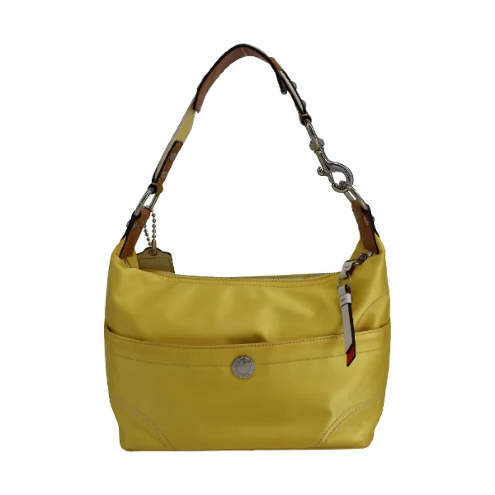Coach Pre-owned Polyester handbags Yellow Dames